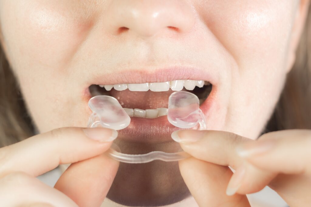 Patient receiving TMD treatment at a dental clinic in Little Rock.